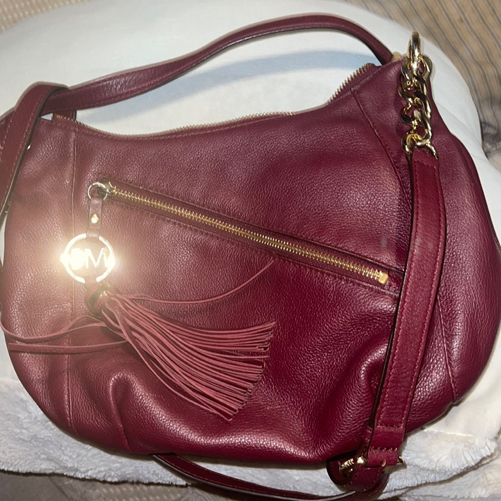 Michael Kors charm tassel purse in Plum/Maroon